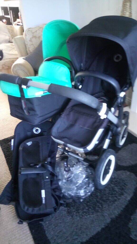 Lovely Unusual Black and Jade Bugaboo Donkey Duo 