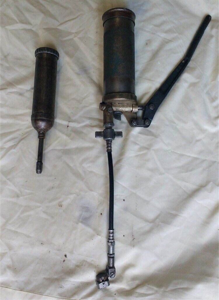 TWO GREASE  GUNS VINTAGE