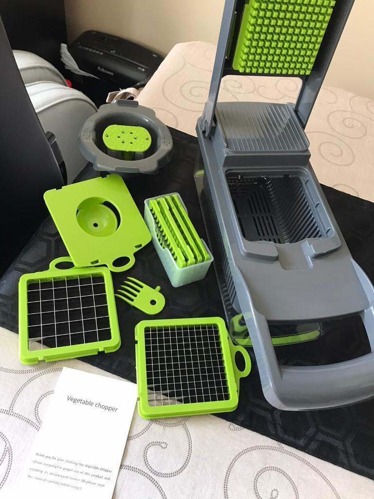 Food chopper, slicer, dicer, grater and julienne