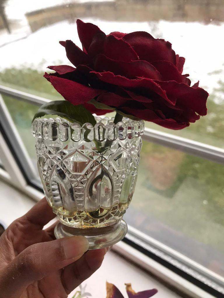 Small vase with red rose 