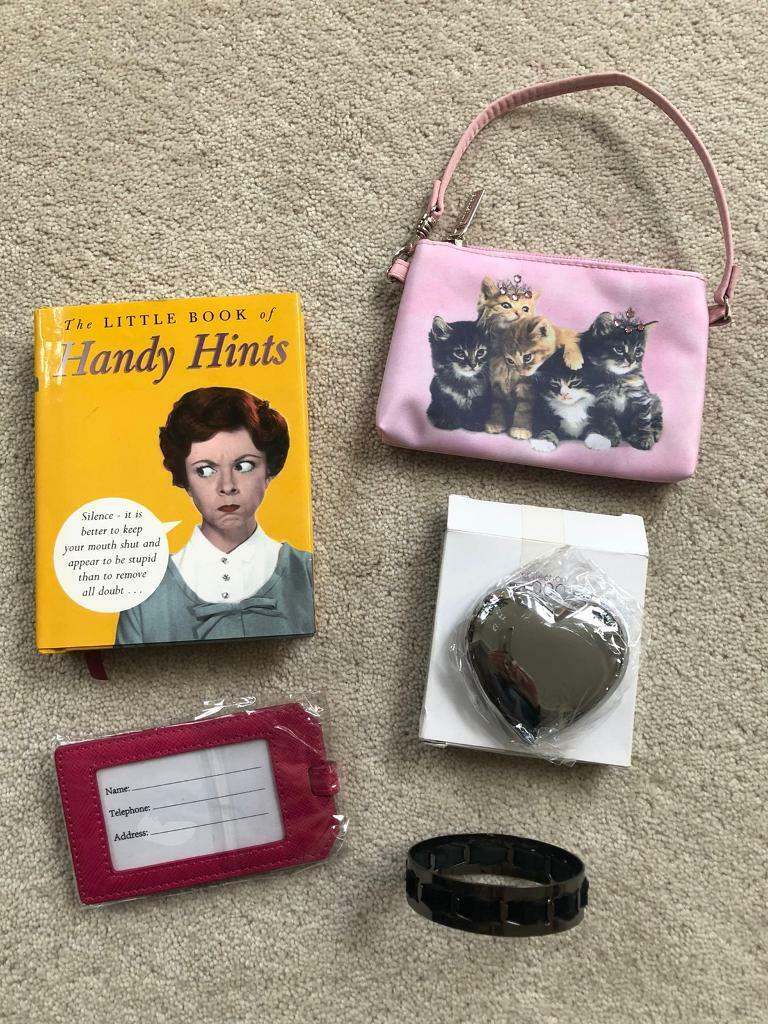Heart shaped mirror, Handy Hints book, Kitten purse, Luggage label