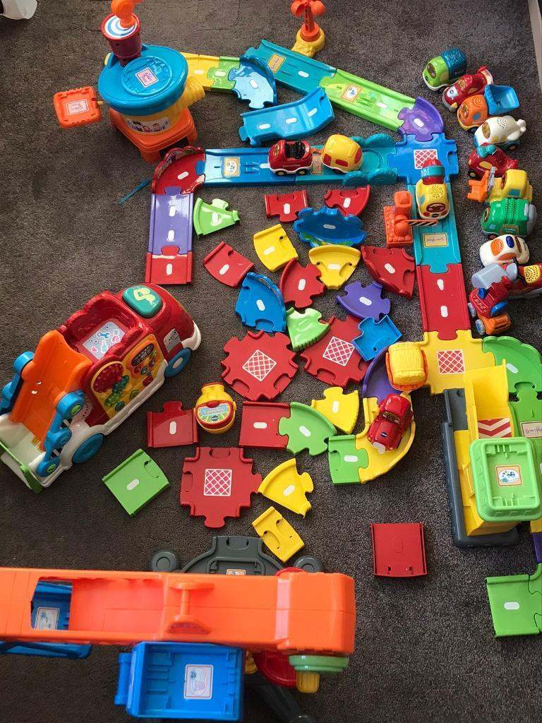 Bundle of Vtech toot toot drivers playsets and vehicles 
