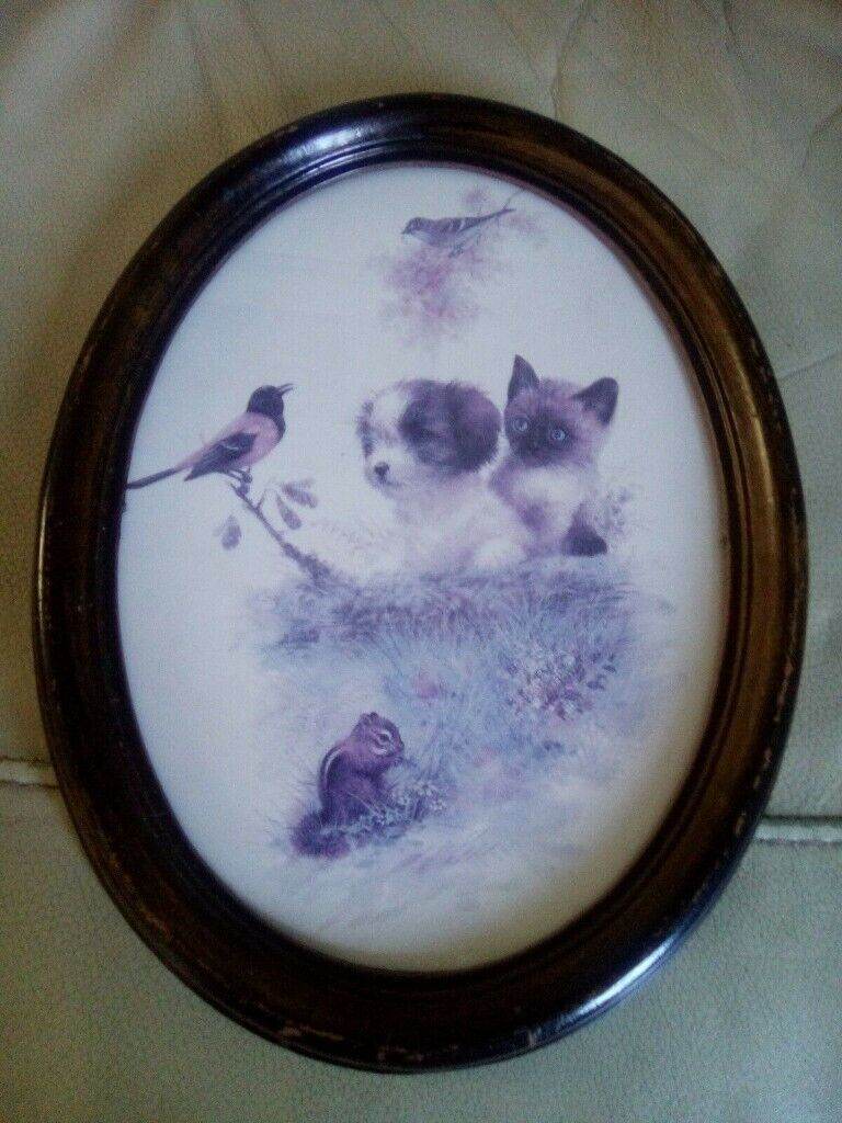 Picture of cute animals, 2 birds ,a puppy, a kitten and a Squirrel .Print is oval