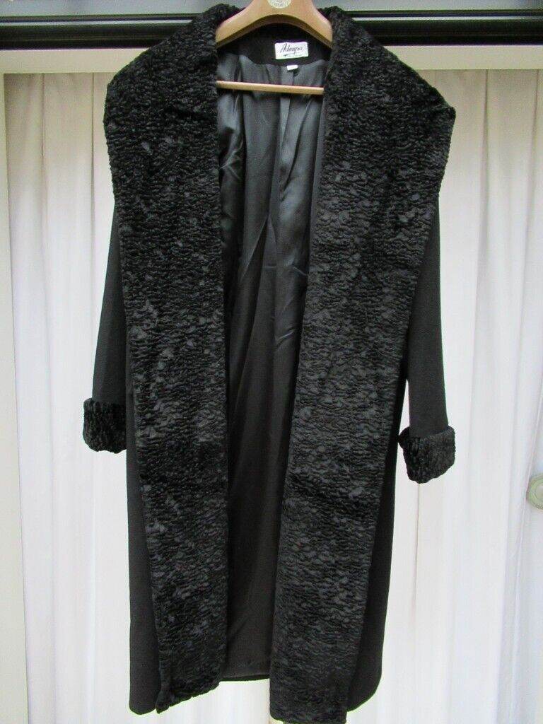 Ladies elegant designer 'Admyra' coat in black. 'Medium' probably fits Size 16-20. 