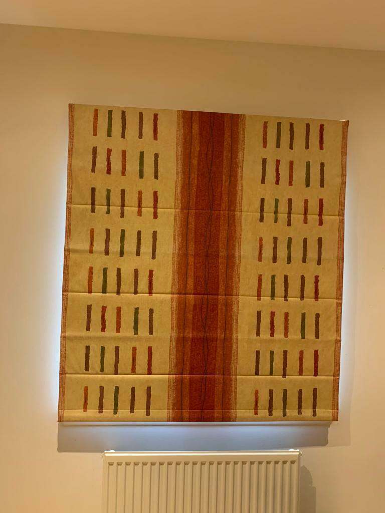 Red and yellow Roman blind