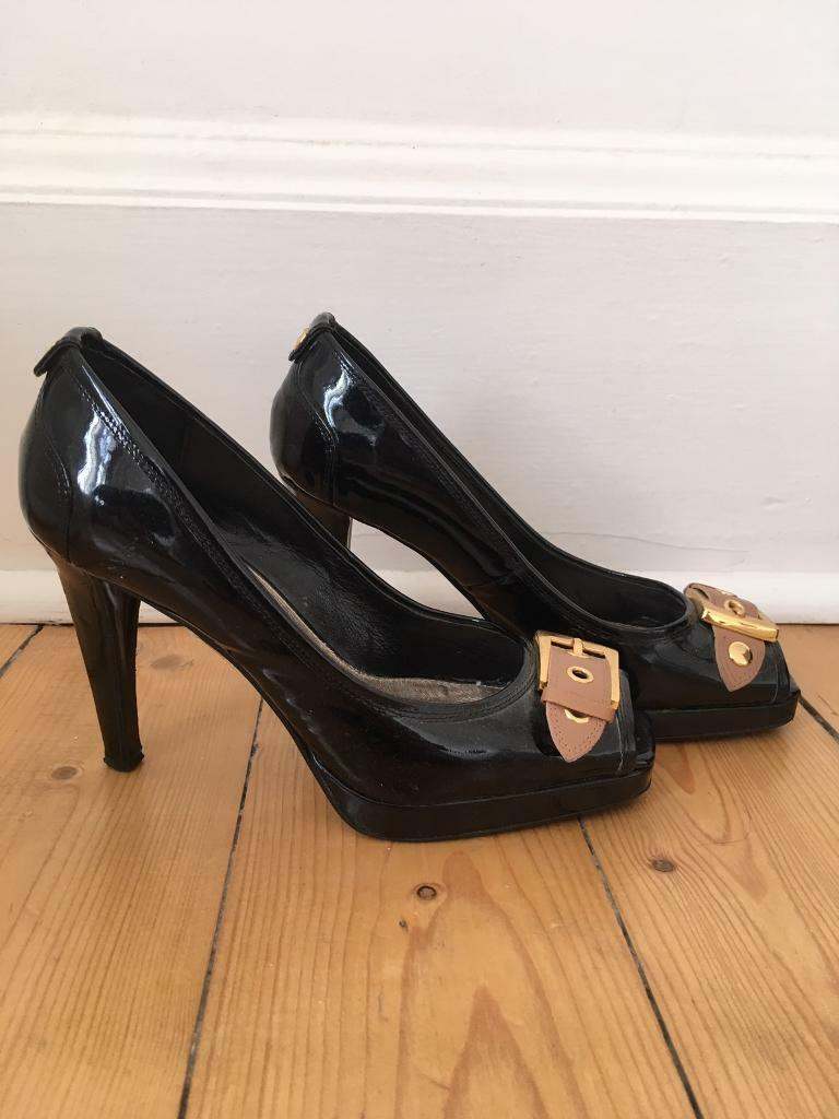 Moda in Pelle black patent heels. 