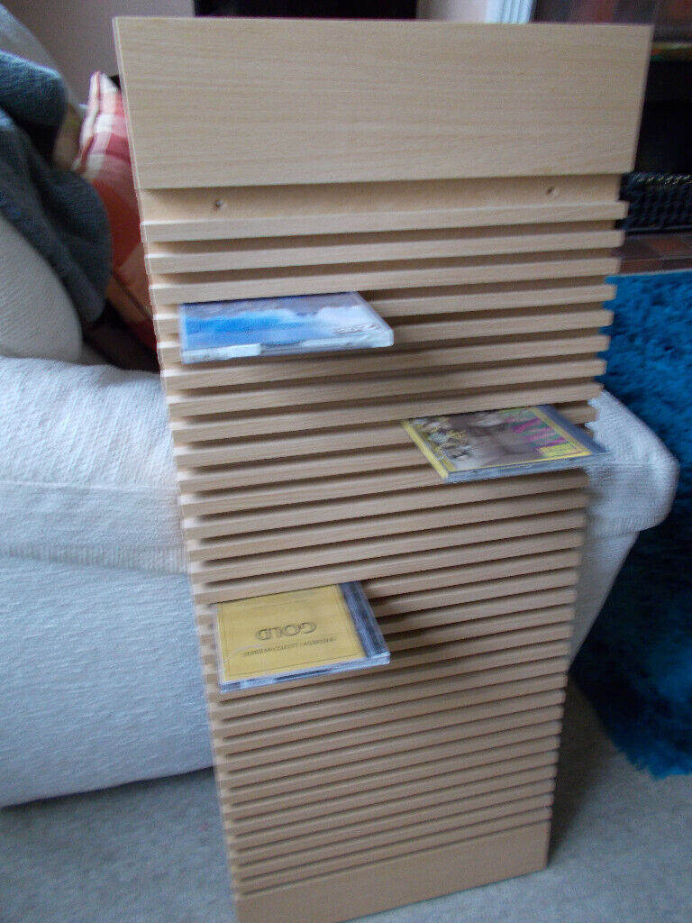 CD holder, freestanding or suitable for mounting on a wall
