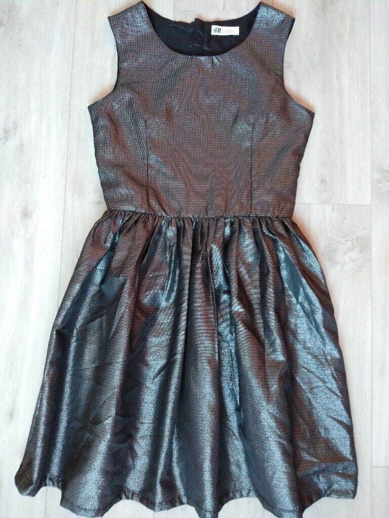 Prom Dress/ Party Dress, as new. Knee length: teen 170 cm. Shimmery black; lined