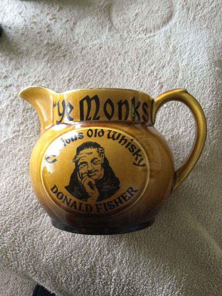 Very collectible vintage Wade Ye Monks Curious old whisky jug.