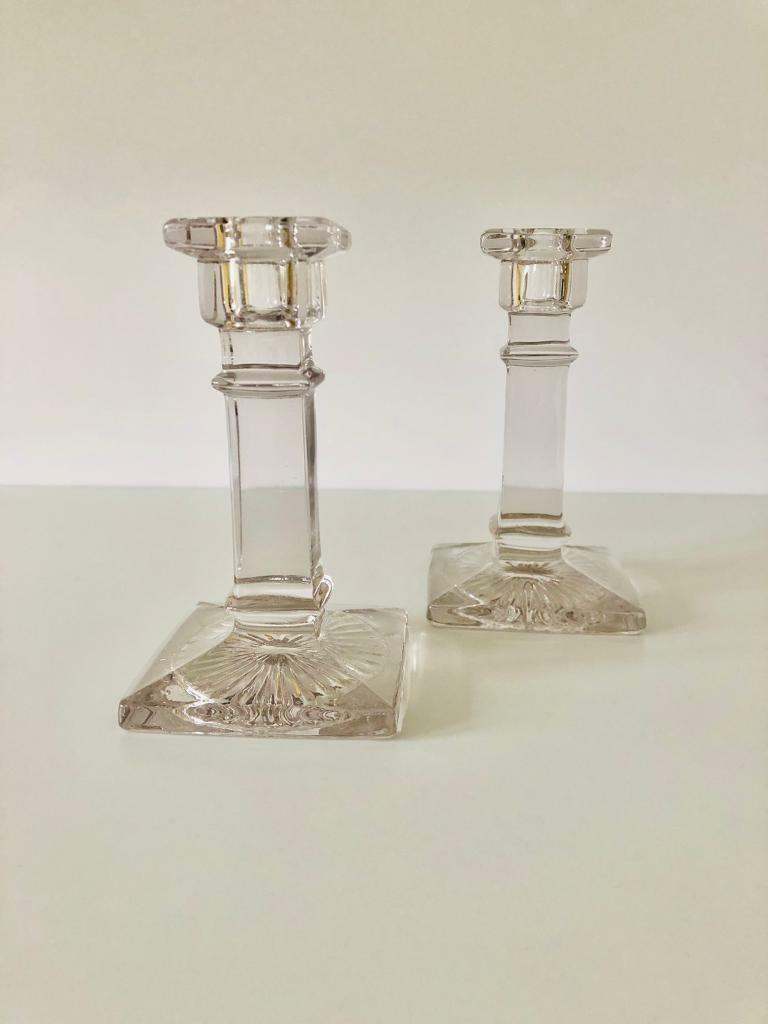 A Pair Of Art Deco Candle Stick Holders