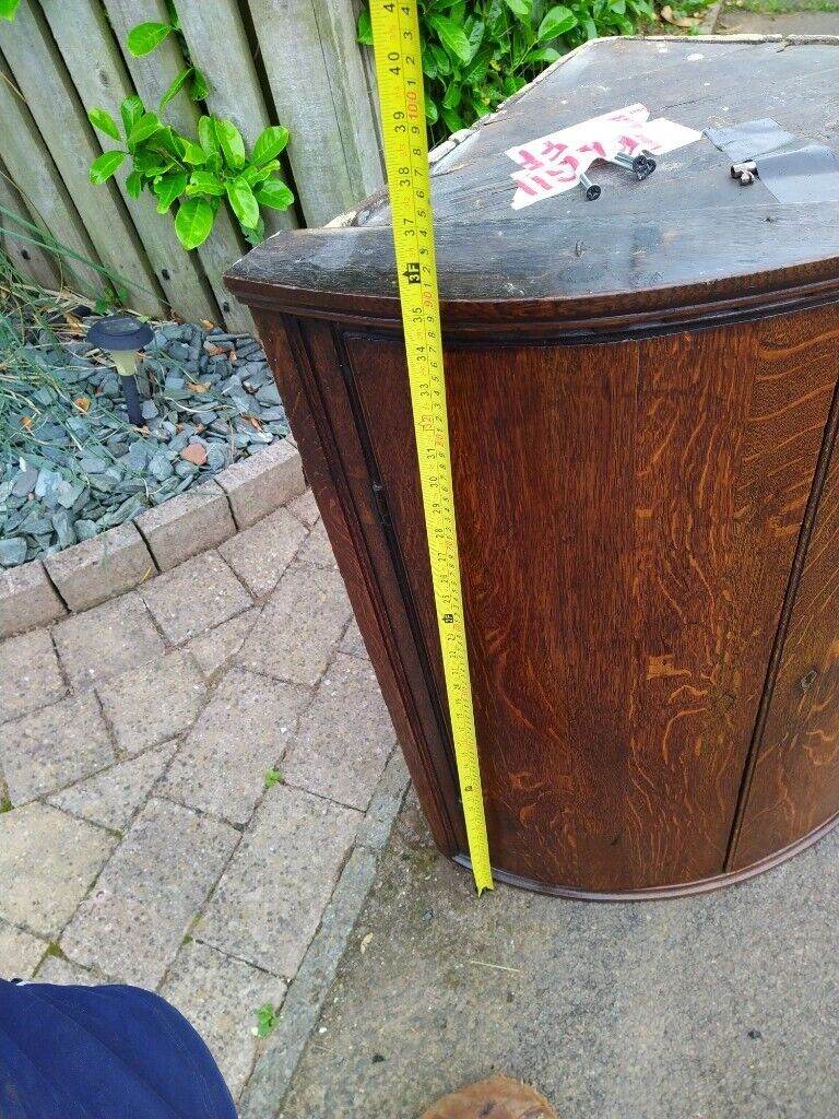 Antique Oak corner cupboard bow fronted 