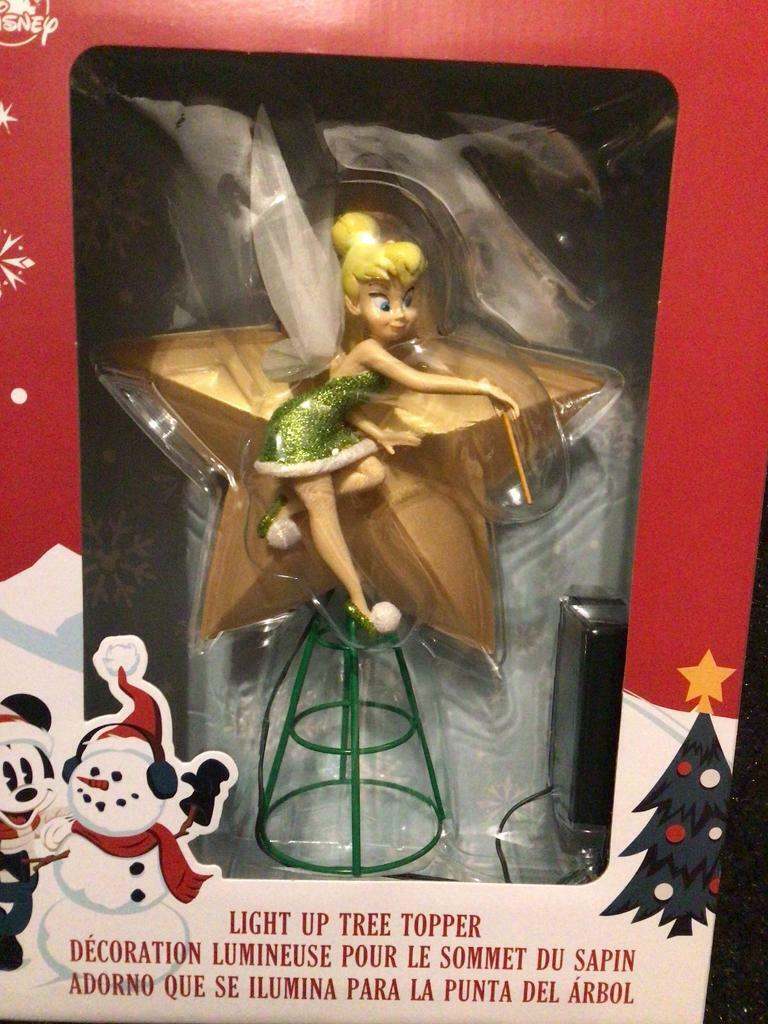 Disney store tree topper brand new in box 