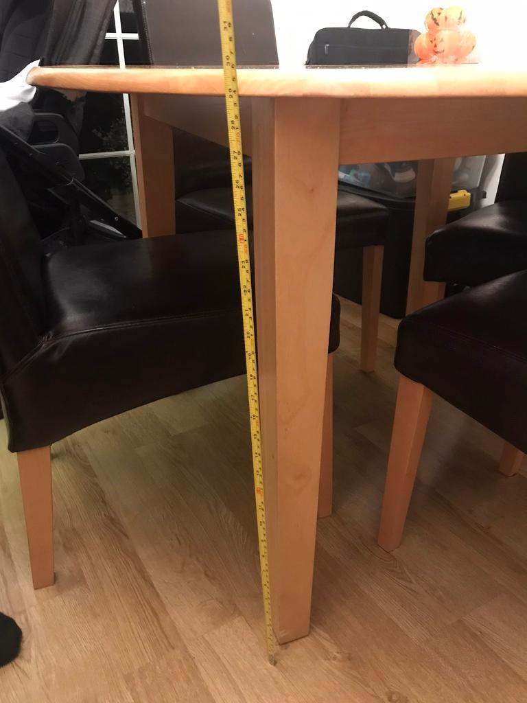 Wooden dining table + 4 chairs