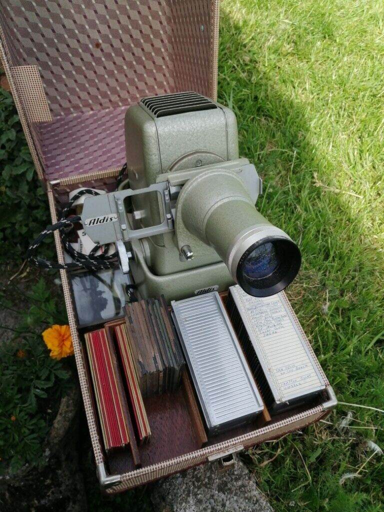 VINTAGE SLIDE PROJECTOR PLUS HAND PAINTED SLIDES