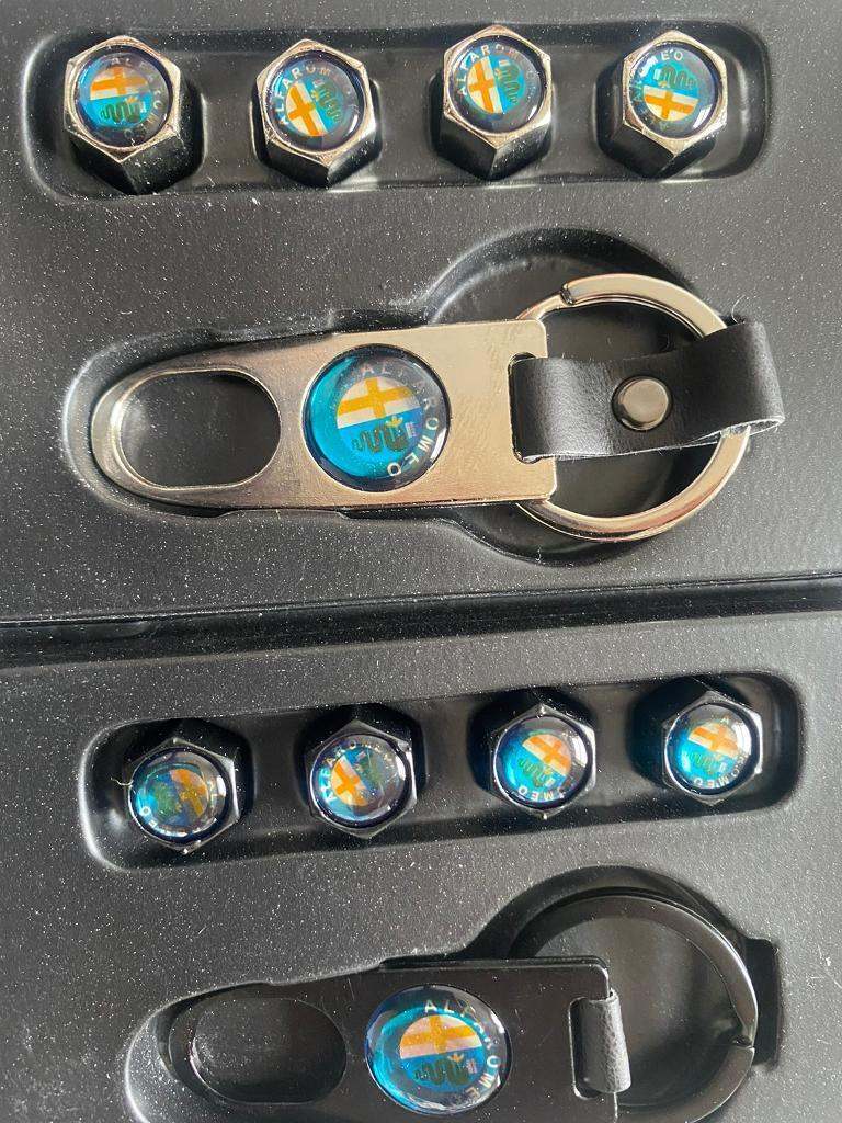 Alfa romeo Alloy wheels dust caps air valve covers with keyring