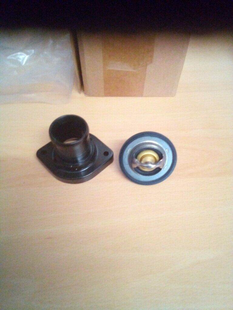 THERMOSTAT AND HOUSING 