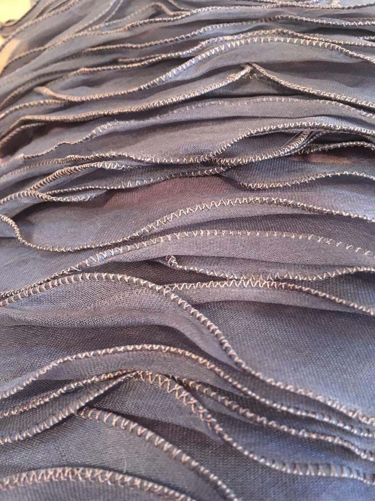 2 lovely purple 100 percent silk cushions from Linea in House of Fraser's