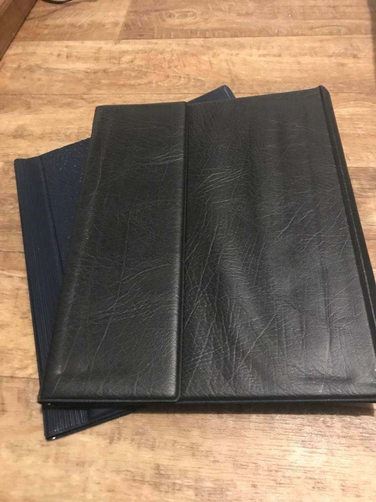 2 brand new A4 conference 4-Ring binders, 1 blue and 1 black. 