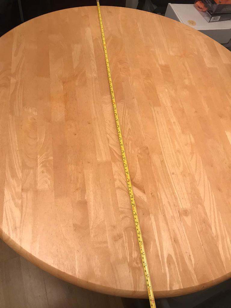 Wooden dining table + 4 chairs