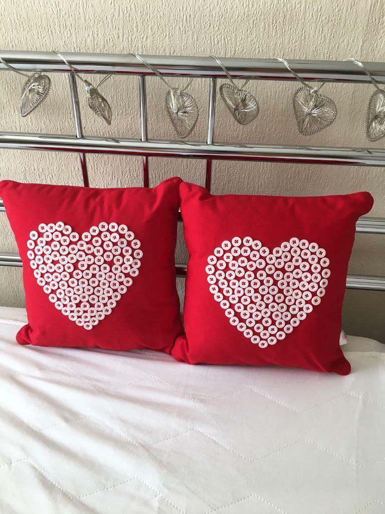 2 red Heart cushions  NWOT