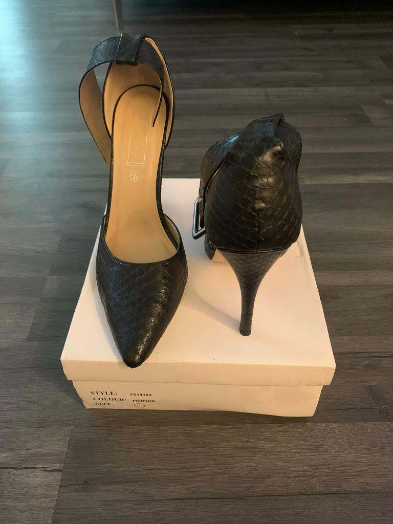 Black snakeskin high heels 