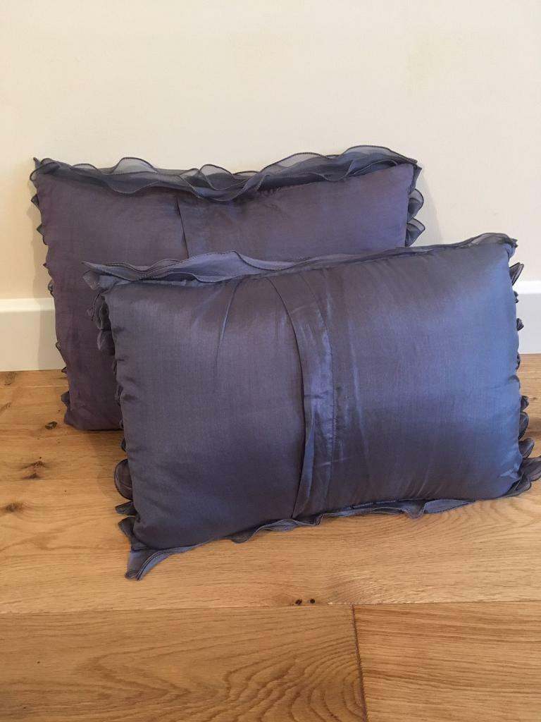 2 lovely purple 100 percent silk cushions from Linea in House of Fraser's
