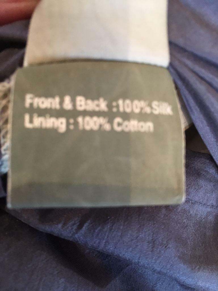 2 lovely purple 100 percent silk cushions from Linea in House of Fraser's