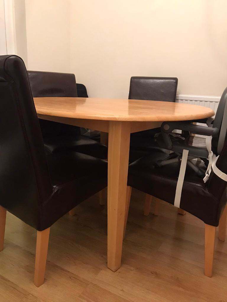 Wooden dining table + 4 chairs