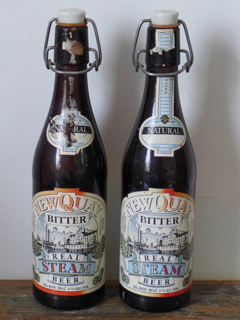 Two 1980s vintage empty NEWQUAY BITTER REAL STEAM BEER Flip-Top Bottles,. £15 for the two.