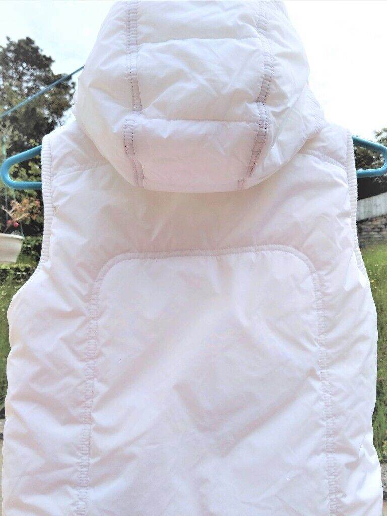 White Padded Gilet with Hood. Clean, cute & trendy for girl c. 8/9 yrs
