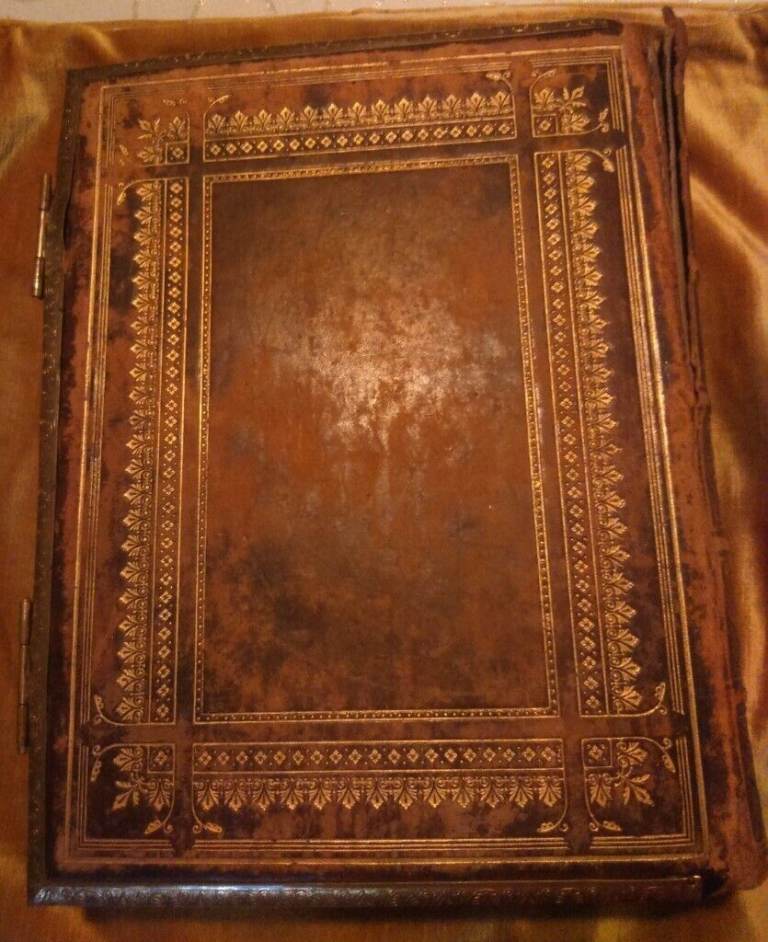 Welsh leather bible with gilt edging and clasps