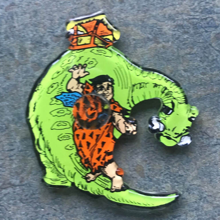 Vintage Fred Flintstone/Dinosaur plastic fridge magnet. Can post.