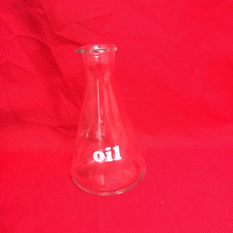 Kitchen, glass oil bottle - no cork stopper. 