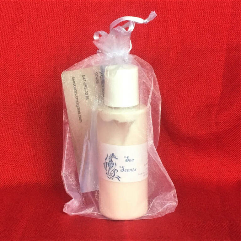 Unused all natural body lotion, Sea Scents 'Rain', in gift bag. Handmade in Orgeon, USA.