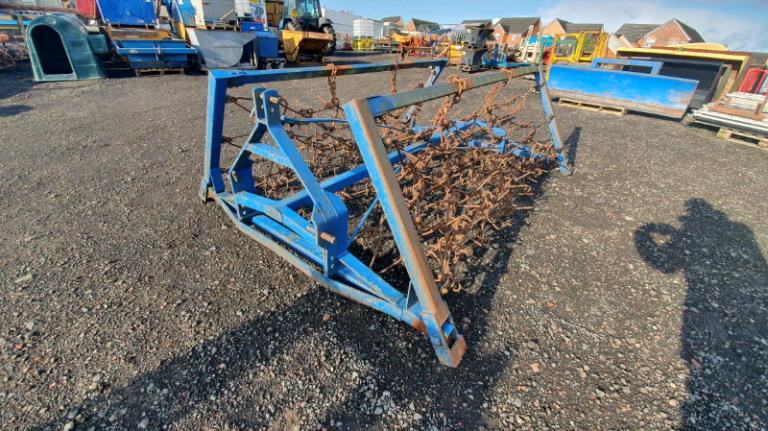 Tractor three point linkage folding grass harrows 