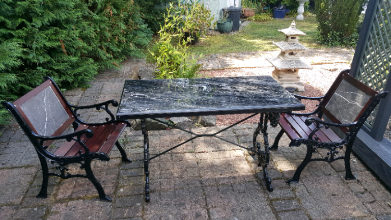 Genuine vintage cast iron table and chairs