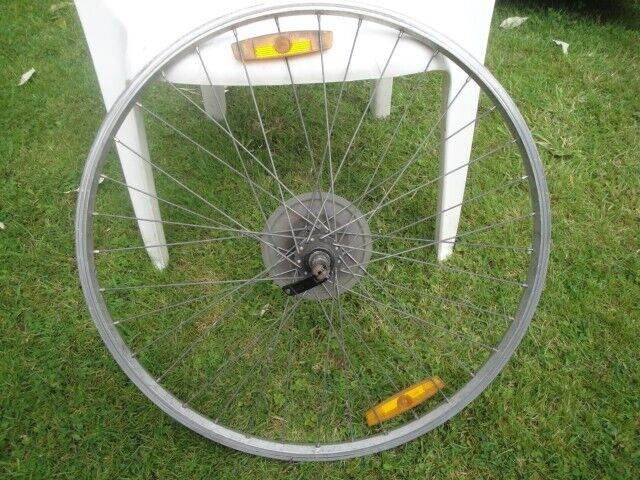 Bike Rear Wheel with 7 cog sprocket.  Size 26in 