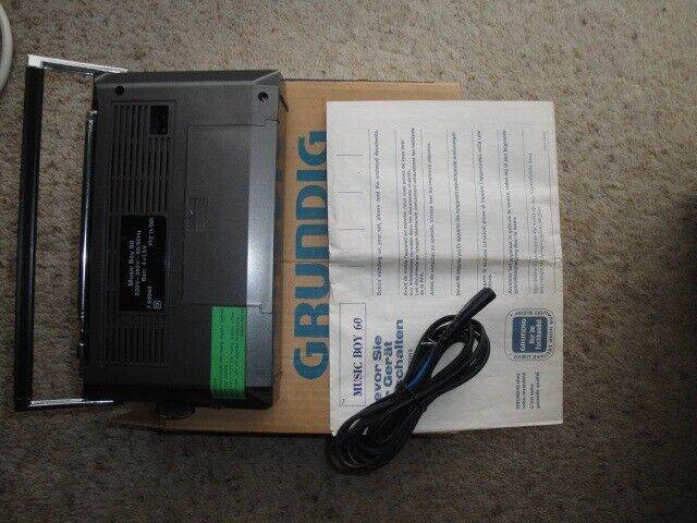 As New Grundig Music-Boy 60L Metallic Portable / Mains Radio. Ref L1306