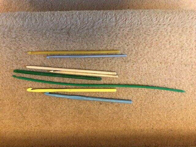 several vintage crochet hooks