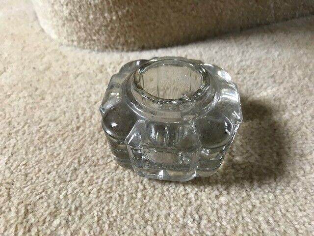 a vintage glass inkwell