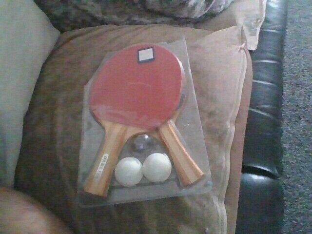 table tennis bats and balls 