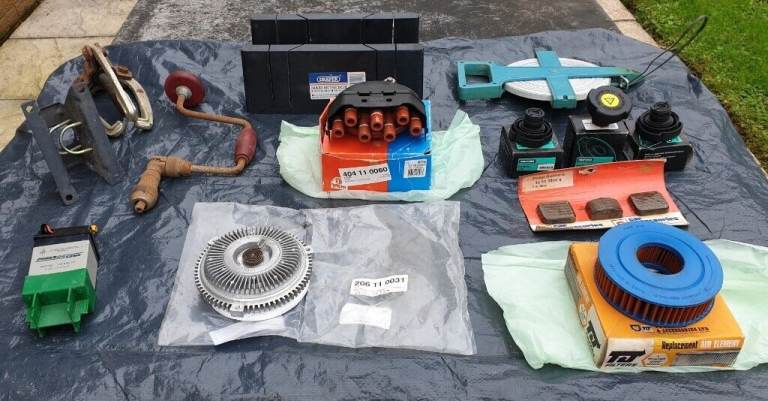 Mishmash 2 - A maxi mitre box, radiator caps, distributor cap, fan coupling etc.
