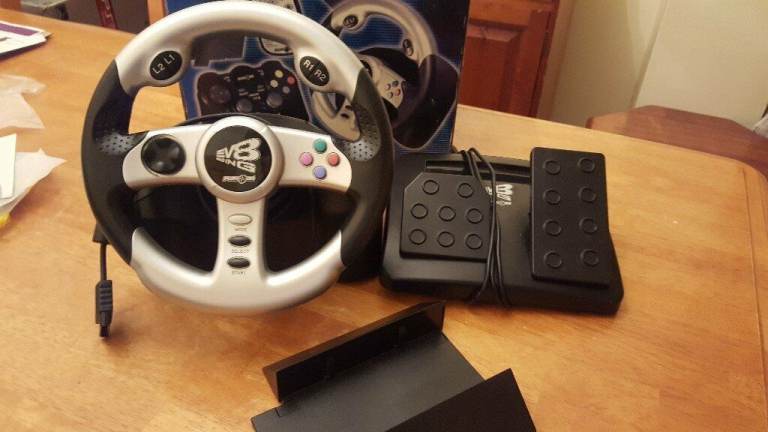 PS2 Steering wheels and peddles Boxed