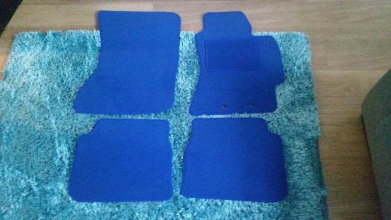 4 x car mats in blue BRAND KNEW 