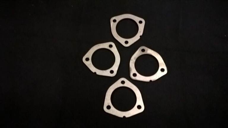 Four Stainless Steel Exhaust Flanges.  
