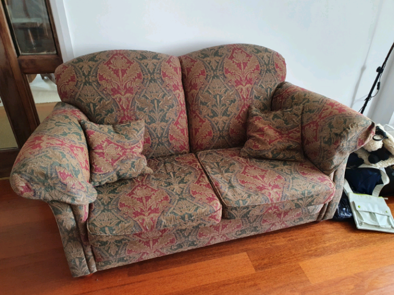 Matching sofa and armchair.