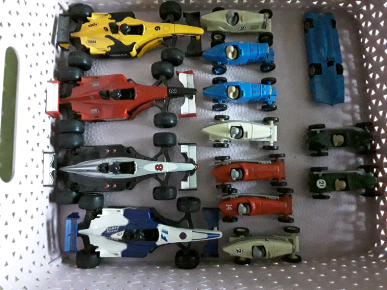 A COLLECTION OF  RACING CAR MODELS/TOYS