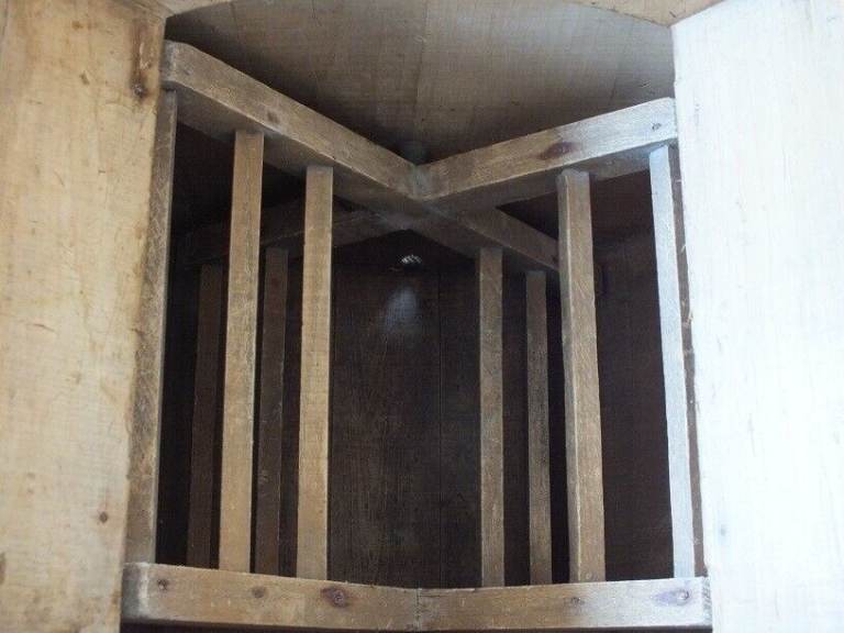 Antique butter churn with original handle and working paddles on its s