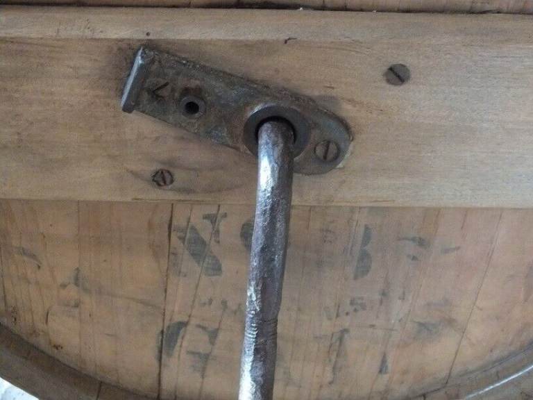 Antique butter churn with original handle and working paddles on its s