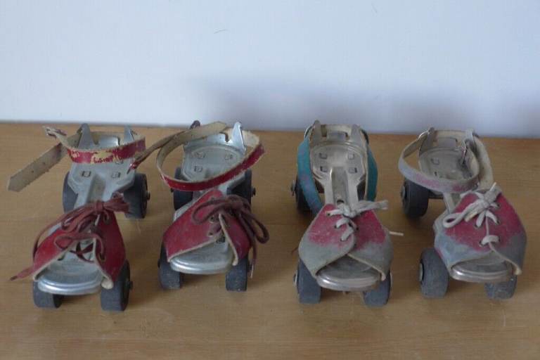 Two pairs of Children's, Adjustable, Vintage, Strap-On, Roller Skates. Believe date to 1940s / 1950s